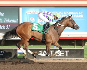 Cupid's Crush wins the Frances Genter Stakes at Caterbury Park. 