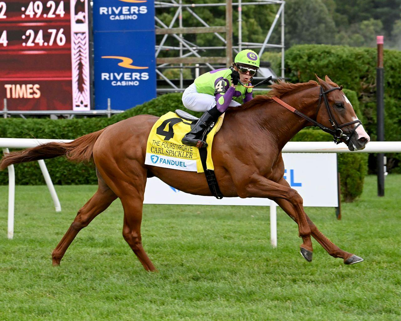 Carl Spackler winning the Fourstardave H. (G1) at Saratoga (Photo by Coglianese Photos)