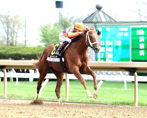 Further Ado wins the Blue Grass Stakes at Keeneland.
