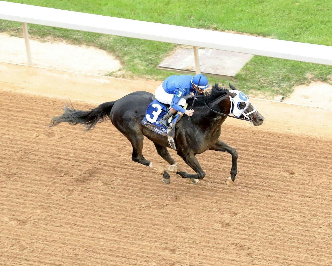 First Mission wins the Oaklawn Handicap at Oaklawn Park.