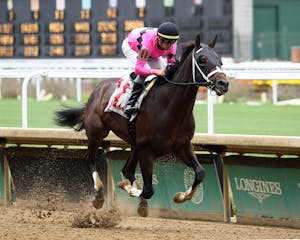 Instant Replay wins at Churchill Downs. 