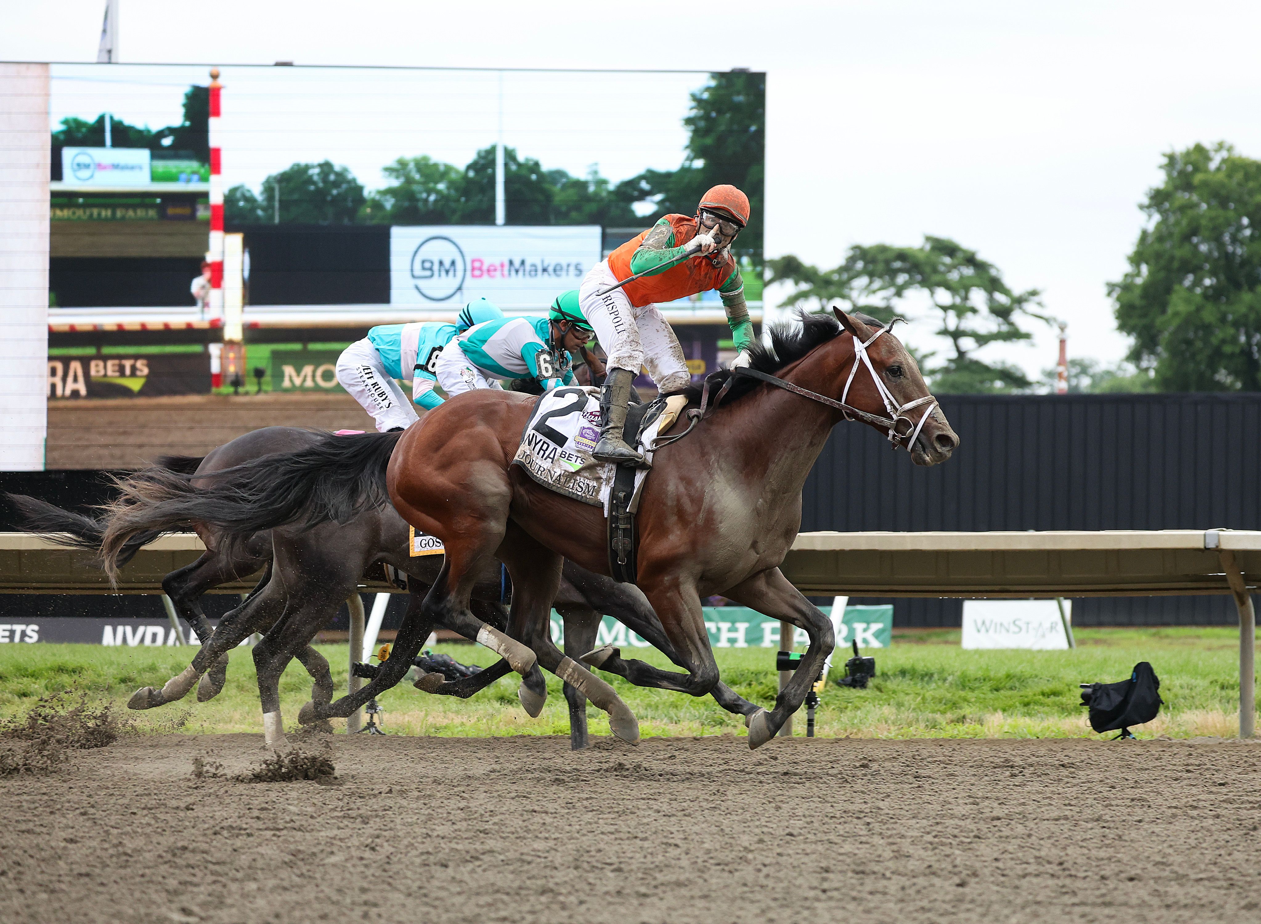 Journalism wins the Haskell at Monmouth Park. 