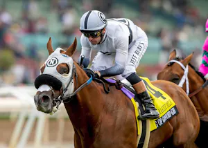 King of Gosford wins the Shoemaker Mile at Santa Anita.
