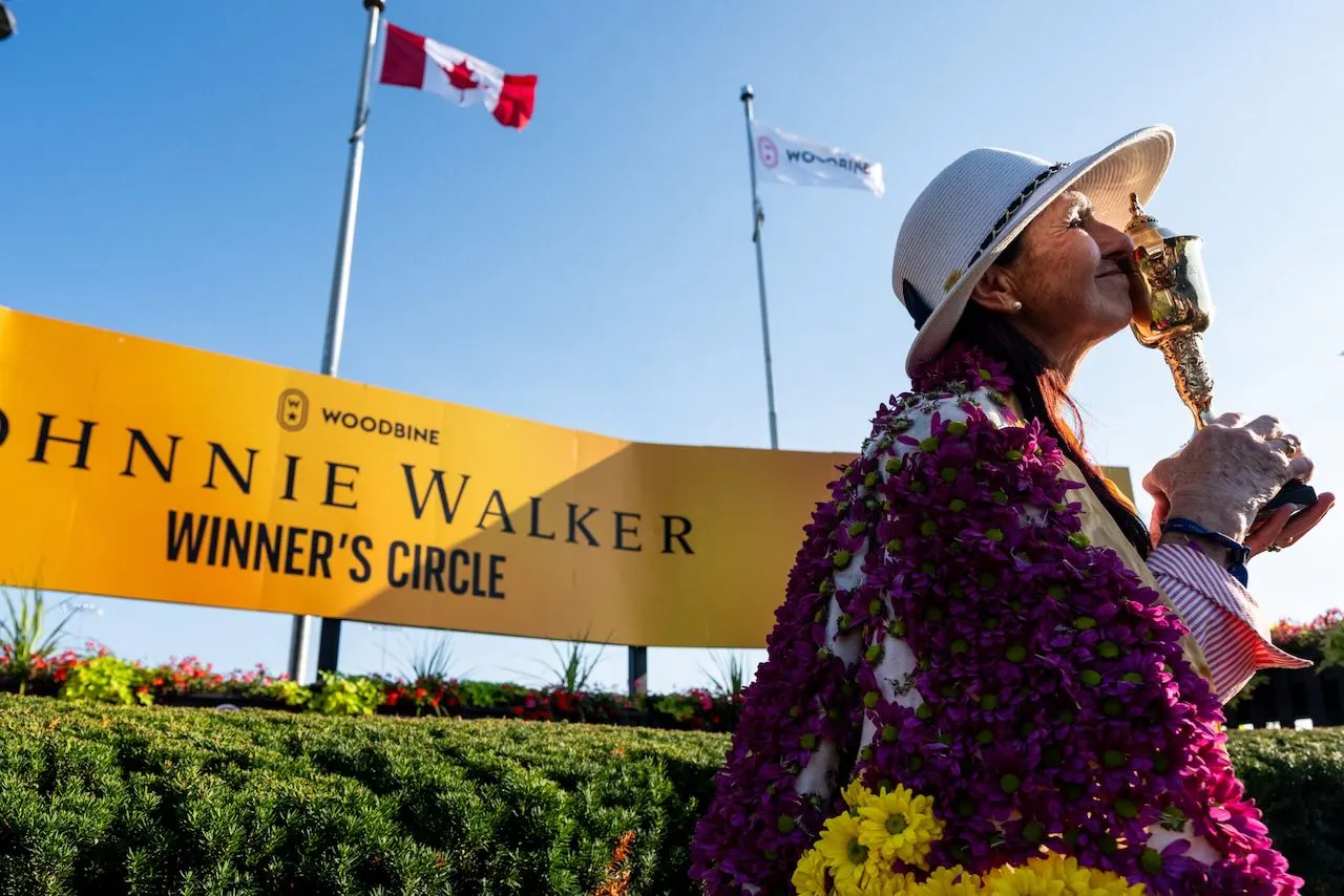 Josie Carroll with the King’s Plate trophy at Woodbine