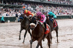 Macho Music winning the Pat Day Mile (G2) at Churchill Downs