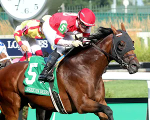 Minaret Station wins the American Derby at Churchill Downs.