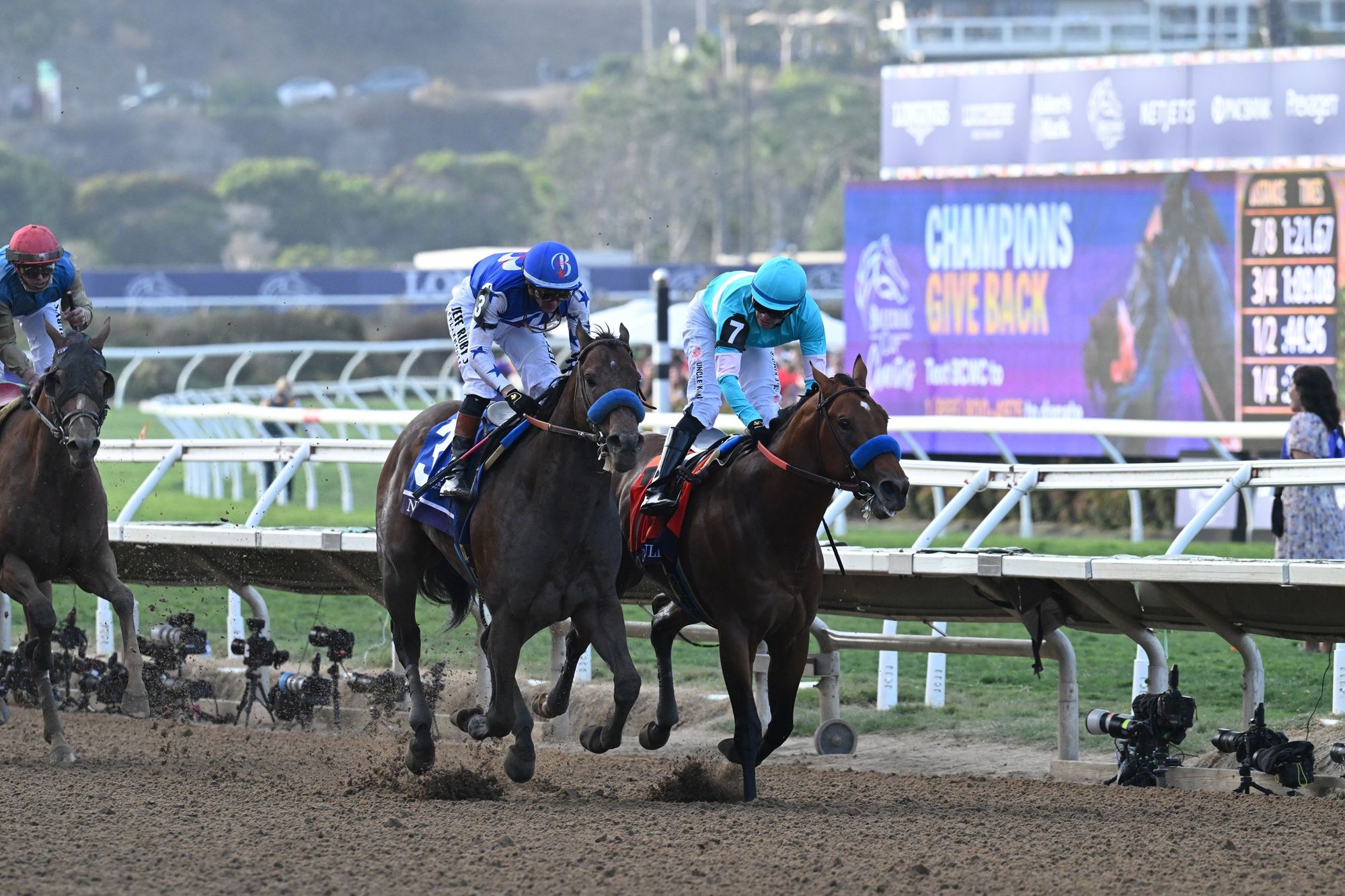 Nysos (outside) winning the Breeders' Cup Dirt Mile (G1) at Del Mar
