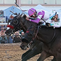 Pavlovian (outside) catches Express Kid in a thrilling Sunland Park Derby at Sunland Park