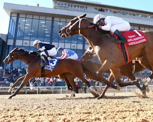 Search Party wins the Martha Washington Stakes at Oaklawn Park.