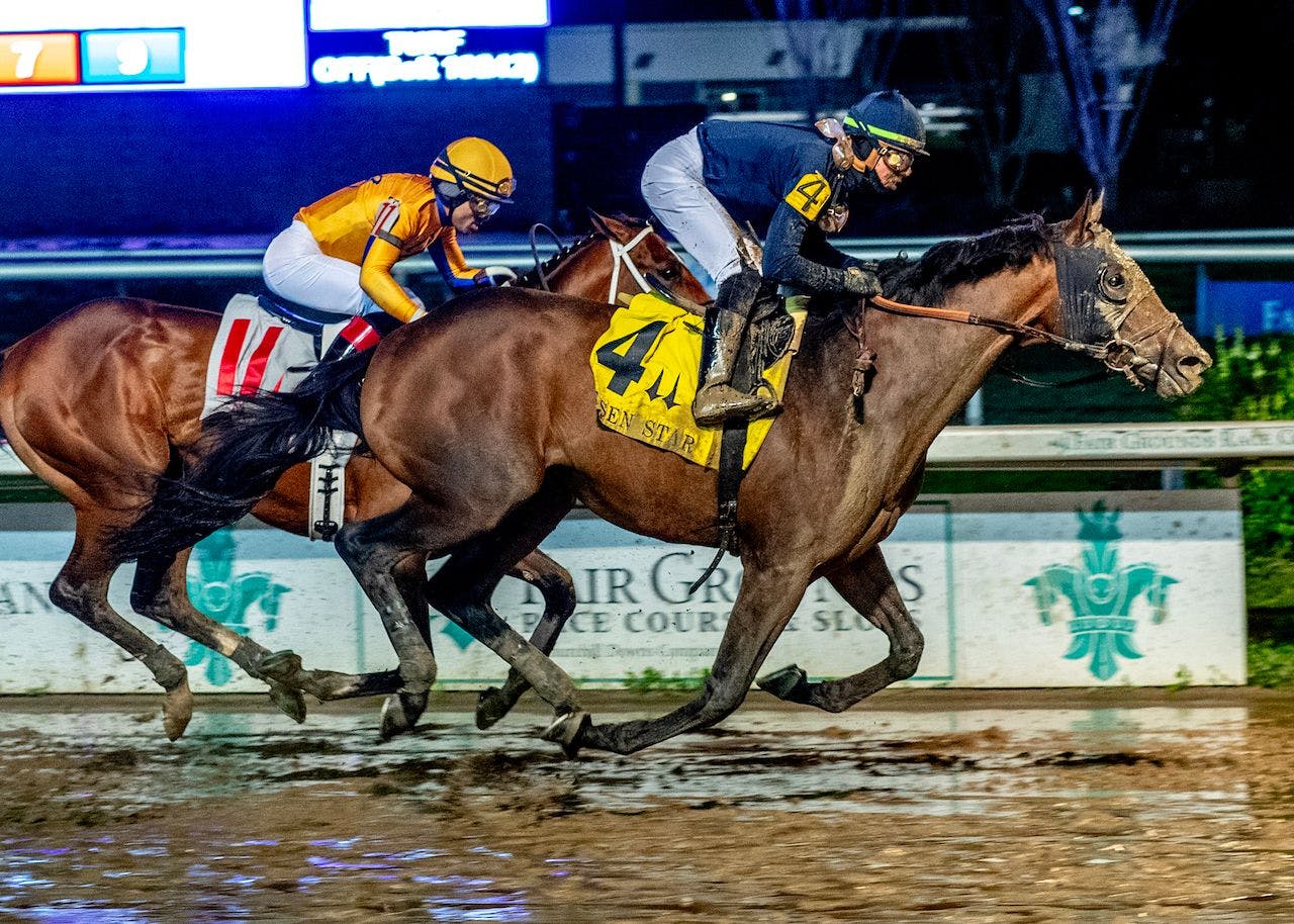 Sierra Leone winning the Risen Star (G2) at Fair Grounds (Photo by Hodges Photography/Lou Hodges, Jr.)