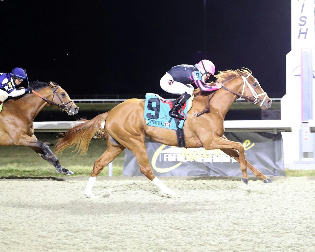 Small Town wins at Turfway Park. 