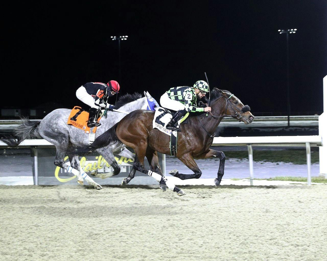 Special Caliber wins at Turfway Park. 