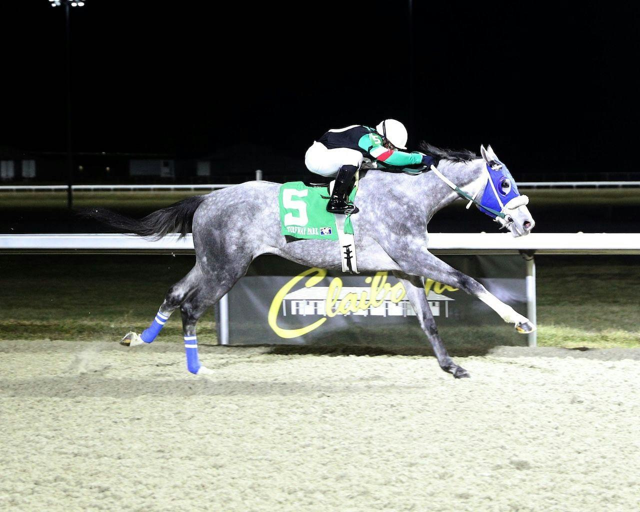 Spirit Rags wins at Turfway Park. 