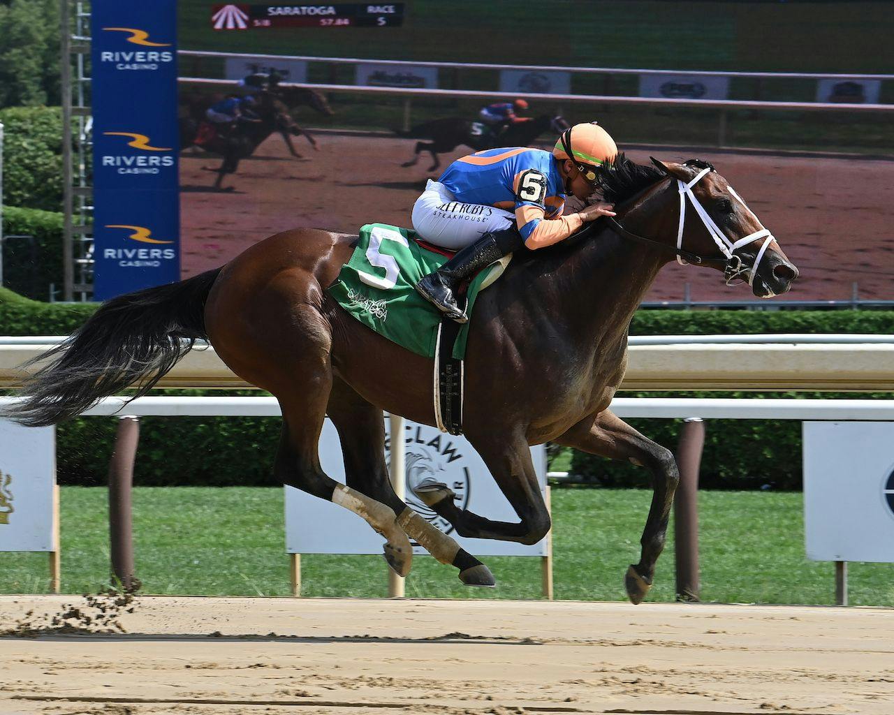 Uncaged breaking his maiden at Saratoga