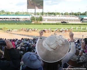Fans cheer at Churchill Downs